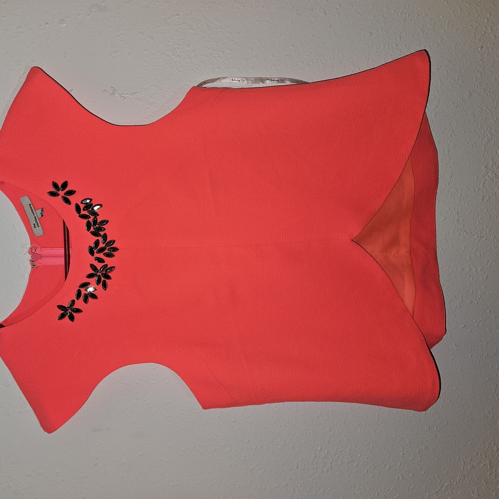 Elegant Coral Blouse with Floral Accents